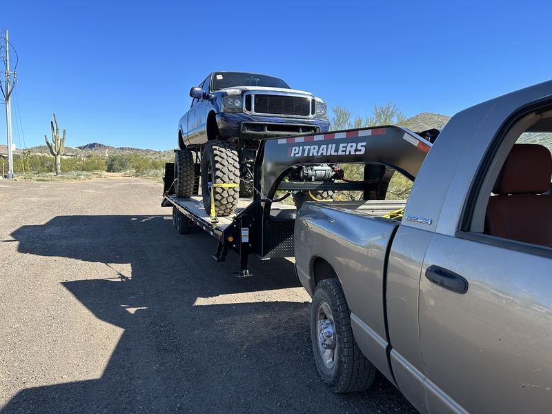 Lifted truck loaded for transport
