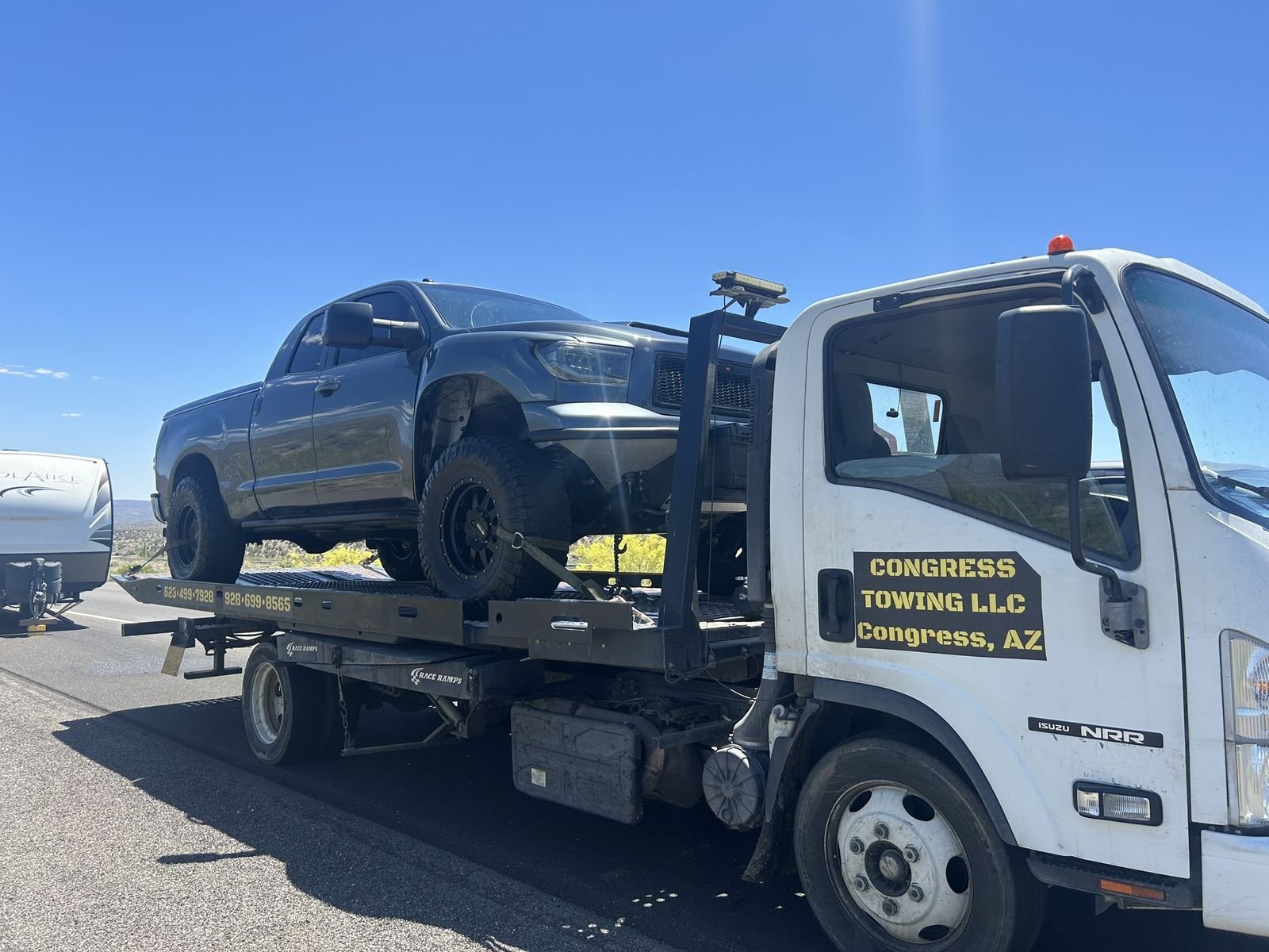Toyota Tundra on the flatbed, desert highway
